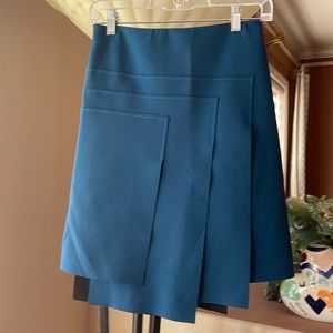 Cop.Copine uneven length modern skirt